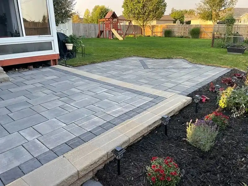 New paver patio in home backyard