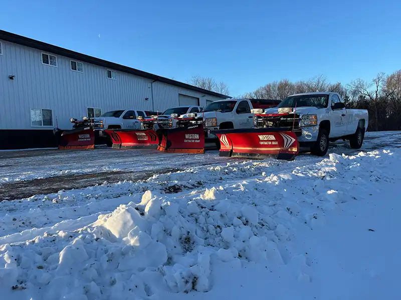 Trucks with snow plows in front